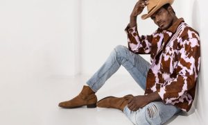 Boy Radio in cowboy hat and briefs, photographed by Greg Endries