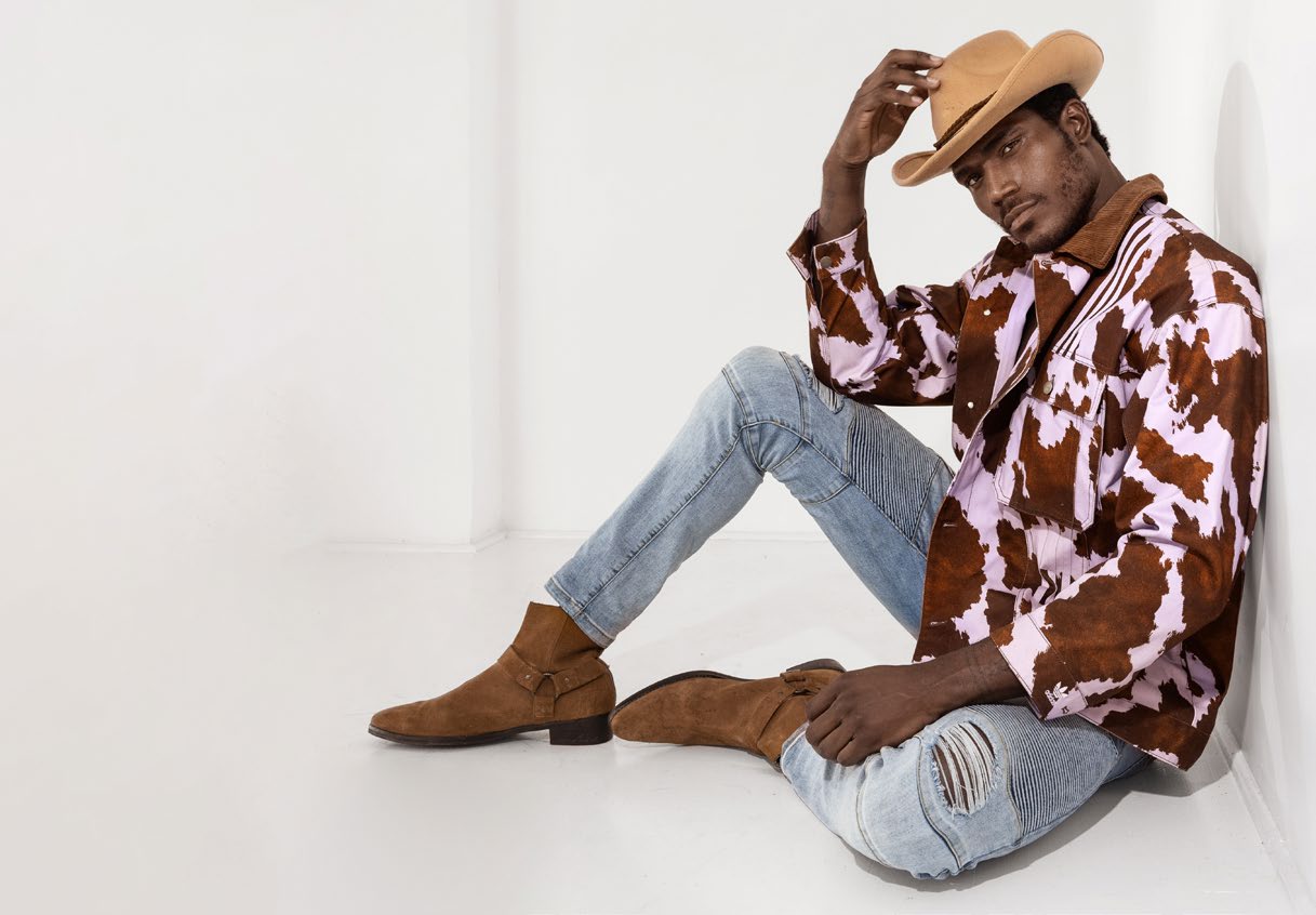 Boy Radio in cowboy hat and briefs, photographed by Greg Endries
