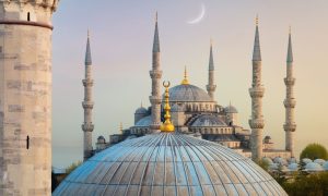 Blue Mosque and Firuz Agha Mosque at dawn with crescent moon, Istanbul