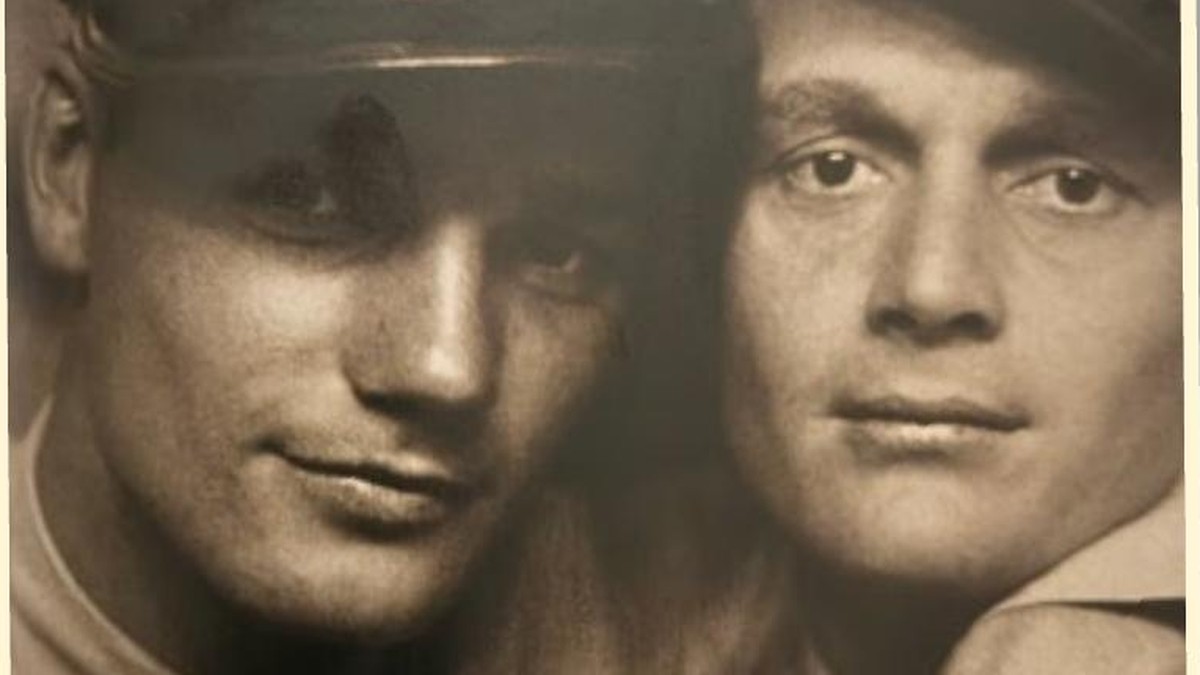 Two US Marines pose cheek to cheek in a vintage photograph from the Loving collection