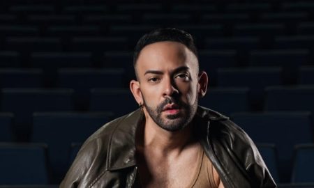 Jose Alfredo, Puerto Rican singer-songwriter, in a leather jacket in an empty theatre